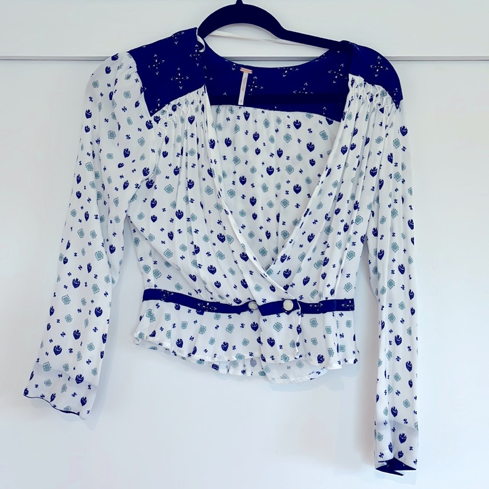 Free People wrap top. Women’s small, never worn.